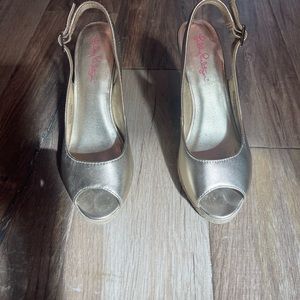 Lilly Pulitzer gold wedge heels. Worn a few times.